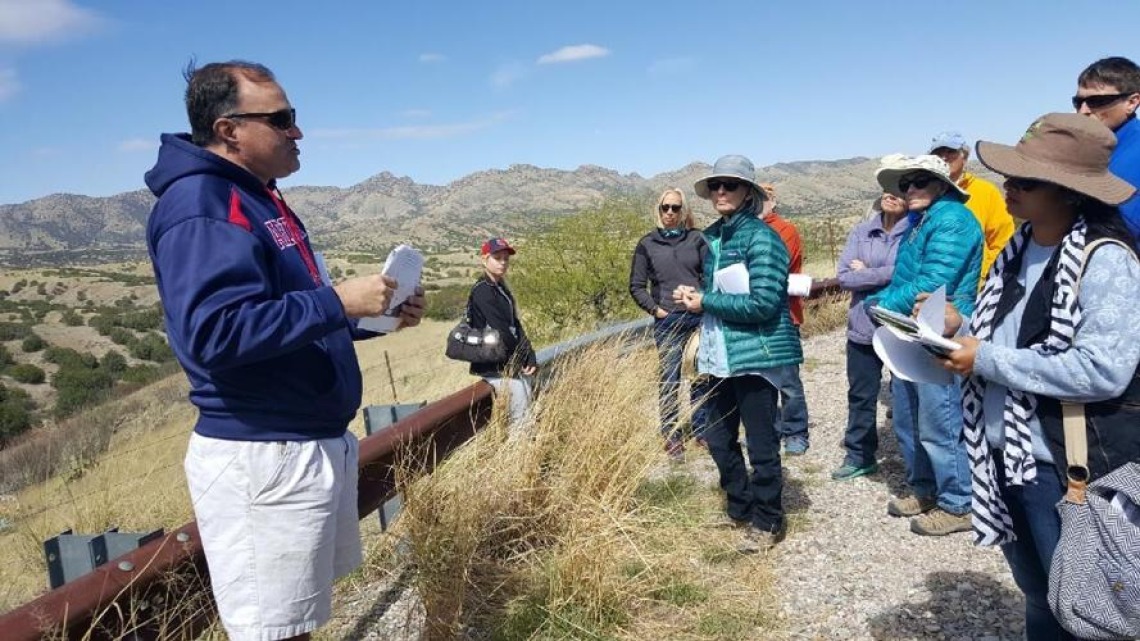Tom Meixner talkd about Rosemont Mine during tour stop along Arizona State Route 82